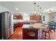 Stylish kitchen with granite counters, stainless appliances, and a central island at 512 Nanny Point Dr, Monroe, NC 28110