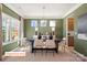 Elegant dining room with modern lighting, decor, and comfortable seating for six at 518 Hullview Vista Vis # 15, Monroe, NC 28110