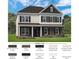 Charming two-story home with a brick and siding exterior and black shutters at 518 Hullview Vista Vis # 15, Monroe, NC 28110