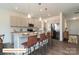 Modern kitchen featuring a spacious island, granite countertops, and stainless steel appliances at 518 Hullview Vista Vis # 15, Monroe, NC 28110