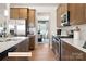 Contemporary kitchen with stainless steel appliances, light countertops, and an open layout to the dining area at 518 Hullview Vista Vis # 15, Monroe, NC 28110