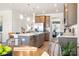 Well-lit kitchen featuring an island with seating, stainless appliances, and stylish decor at 518 Hullview Vista Vis # 15, Monroe, NC 28110