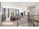 Upstairs loft with a cozy seating area and a bar with stools for entertaining at 518 Hullview Vista Vis # 15, Monroe, NC 28110