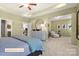 Spacious main bedroom with tray ceilings, sitting area, and a large dresser at 518 Hullview Vista Vis # 15, Monroe, NC 28110