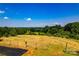 Expansive land parcel showcasing its natural beauty and open spaces with a partial fence at 5258 E Bandys Cross Rd, Catawba, NC 28609