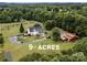 Sprawling property on 9+/- acres features a charming home, outbuildings, and beautiful mature trees at 5258 E Bandys Cross Rd, Catawba, NC 28609