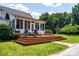 Large tiered backyard deck features plenty of seating with a view of the luscious backyard at 5258 E Bandys Cross Rd, Catawba, NC 28609