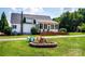 Well-maintained backyard featuring a fire pit, patio, and access to a screened porch at 5258 E Bandys Cross Rd, Catawba, NC 28609