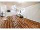 Spacious finished basement featuring wood floors, a drop ceiling, and a partial kitchen area at 5258 E Bandys Cross Rd, Catawba, NC 28609
