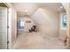 Spacious bonus room with carpeting and natural light from a window at 5258 E Bandys Cross Rd, Catawba, NC 28609