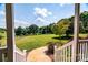 Inviting view from the porch steps overlooking a large, well-manicured front yard at 5258 E Bandys Cross Rd, Catawba, NC 28609