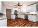 Updated kitchen with stainless appliances, granite countertops, and white cabinets at 5258 E Bandys Cross Rd, Catawba, NC 28609