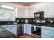 Updated kitchen with granite counters, stainless appliances, and ample storage space at 5258 E Bandys Cross Rd, Catawba, NC 28609