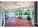 Bright sunroom features a tile floor, lots of windows, and views of the backyard at 5258 E Bandys Cross Rd, Catawba, NC 28609