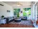 Cozy sunroom with an area rug, comfortable seating, and lots of natural light at 5258 E Bandys Cross Rd, Catawba, NC 28609