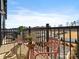 Inviting balcony space featuring outdoor seating and pleasant views, perfect for relaxation and enjoying the outdoors at 5508 Swaling St, Charlotte, NC 28217