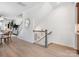 Open-concept home featuring a staircase, lovely decor, and natural light filtering throughout the space at 5508 Swaling St, Charlotte, NC 28217