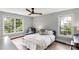 Bedroom with large windows providing plenty of light and a comfortable sitting area at 5517 Alexa Rd, Charlotte, NC 28277