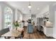 Open kitchen layout with stainless steel appliances, a breakfast nook, and ample counter space at 5517 Alexa Rd, Charlotte, NC 28277
