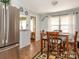 Cozy dining area with a wooden table set, next to an open layout concept at 5629 Ruth Dr, Charlotte, NC 28215