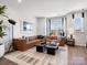Comfortable living room with a large sectional sofa and stylish decor at 5731 Castlerea Dr, Charlotte, NC 28217
