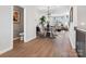Open-concept living room and dining area with stylish finishes and ample natural light at 5731 Castlerea Dr, Charlotte, NC 28217