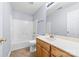 Neutral bathroom featuring a tub-shower combo and a single-sink vanity at 613 Church St, Belmont, NC 28012