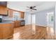 Spacious eat-in kitchen with lots of cabinet storage and wood-look flooring at 613 Church St, Belmont, NC 28012