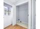 Cozy laundry room with a door to the outside and storage shelves at 613 Church St, Belmont, NC 28012