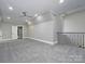 Upstairs bonus room with carpet flooring, neutral walls, and recessed lighting at 7215 Alexander Rd # 4, Charlotte, NC 28270