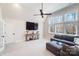Bonus room with vaulted ceiling, neutral carpet, a ceiling fan, and backyard views at 7215 Alexander Rd # 4, Charlotte, NC 28270