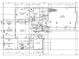 Detailed first-floor plan showcasing the layout of the kitchen, living spaces, and garage at 7215 Alexander Rd # 4, Charlotte, NC 28270