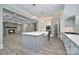 Modern kitchen with a large island, stainless steel appliances, and an open layout at 7215 Alexander Rd # 4, Charlotte, NC 28270