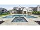 Backyard showcasing a pool, spa, and patio area, perfect for outdoor entertaining at 7215 Alexander Rd # 4, Charlotte, NC 28270