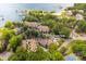 Stunning aerial view of 753 Southwest Drive in a lakeside community with a pool, tennis court, and marina at 753 Southwest Dr, Davidson, NC 28036