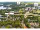 Aerial view showing proximity to local schools, retail, and downtown Davidson from the community at 753 Southwest Dr, Davidson, NC 28036