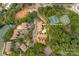 Aerial view showing community amenities: pool, tennis courts, parking, and water access at 753 Southwest Dr, Davidson, NC 28036