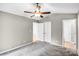 Bedroom with multiple doors and doorways creating easy access to other areas of the home at 753 Southwest Dr, Davidson, NC 28036