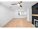 Open-concept living space with light wood floors and clear sightlines to the kitchen, promoting easy flow at 753 Southwest Dr, Davidson, NC 28036