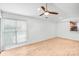 Bright living area featuring natural light, and a large window, creating a welcoming atmosphere at 753 Southwest Dr, Davidson, NC 28036