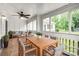 Covered patio area with a dining table, chairs, and seating area at 753 Southwest Dr, Davidson, NC 28036