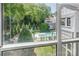 Beautiful view of the community pool area from a window overlooking the backyard at 753 Southwest Dr, Davidson, NC 28036