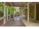 Back porch with brick and wood features at 8 Sunrise Point Rd, Lake Wylie, SC 29710