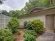 Private backyard offers a tranquil seating area amidst lush greenery at 8 Sunrise Point Rd, Lake Wylie, SC 29710