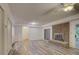 Finished basement featuring a brick fireplace, neutral walls, and wood-look flooring at 8 Sunrise Point Rd, Lake Wylie, SC 29710