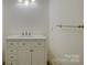 Small half-bathroom with a white vanity and a quartz countertop at 8 Sunrise Point Rd, Lake Wylie, SC 29710
