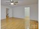 Large bedroom with hardwood flooring and ample closet space at 8 Sunrise Point Rd, Lake Wylie, SC 29710
