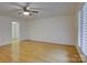 Spacious bedroom with hardwood floors and a ceiling fan at 8 Sunrise Point Rd, Lake Wylie, SC 29710