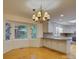 Open-concept kitchen and breakfast nook with bright natural light at 8 Sunrise Point Rd, Lake Wylie, SC 29710