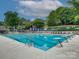 Large community pool features well-maintained diving boards and chairs, perfect for relaxation at 8 Sunrise Point Rd, Lake Wylie, SC 29710